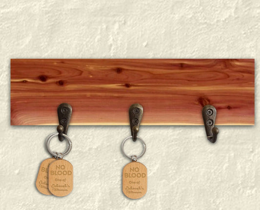 JW  NO Blood wood keychain oval
